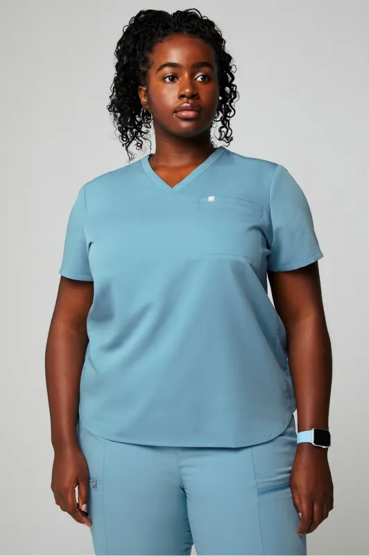 Vital 1-Pocket Scrub Top sold by Fabletics