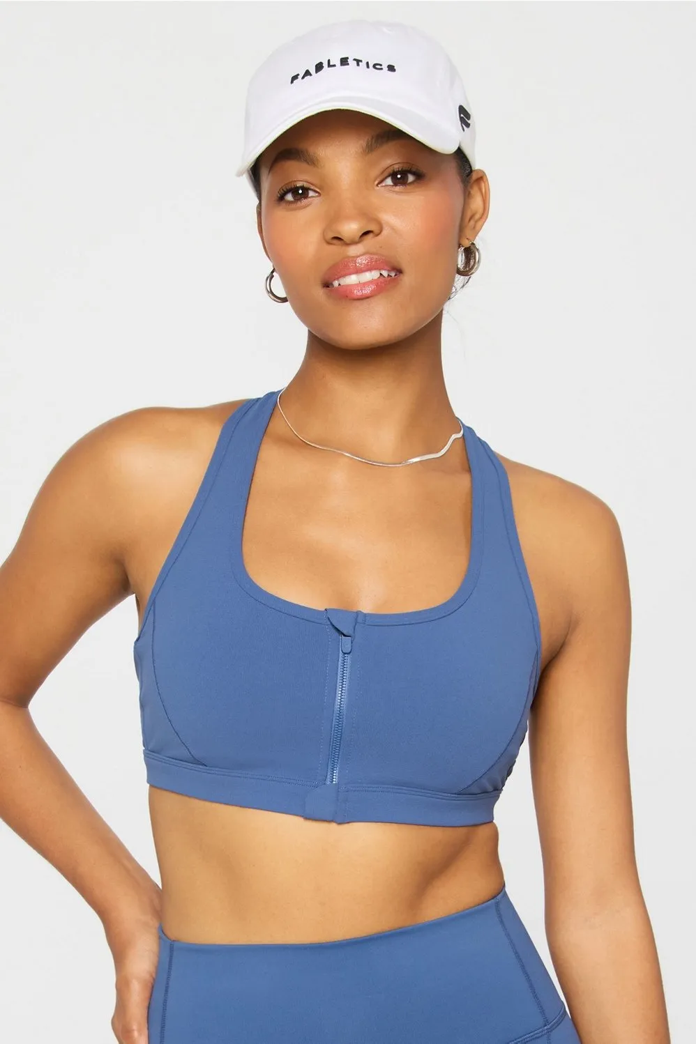 Essential Front Zip Medium Impact Sports Bra sold by Fabletics