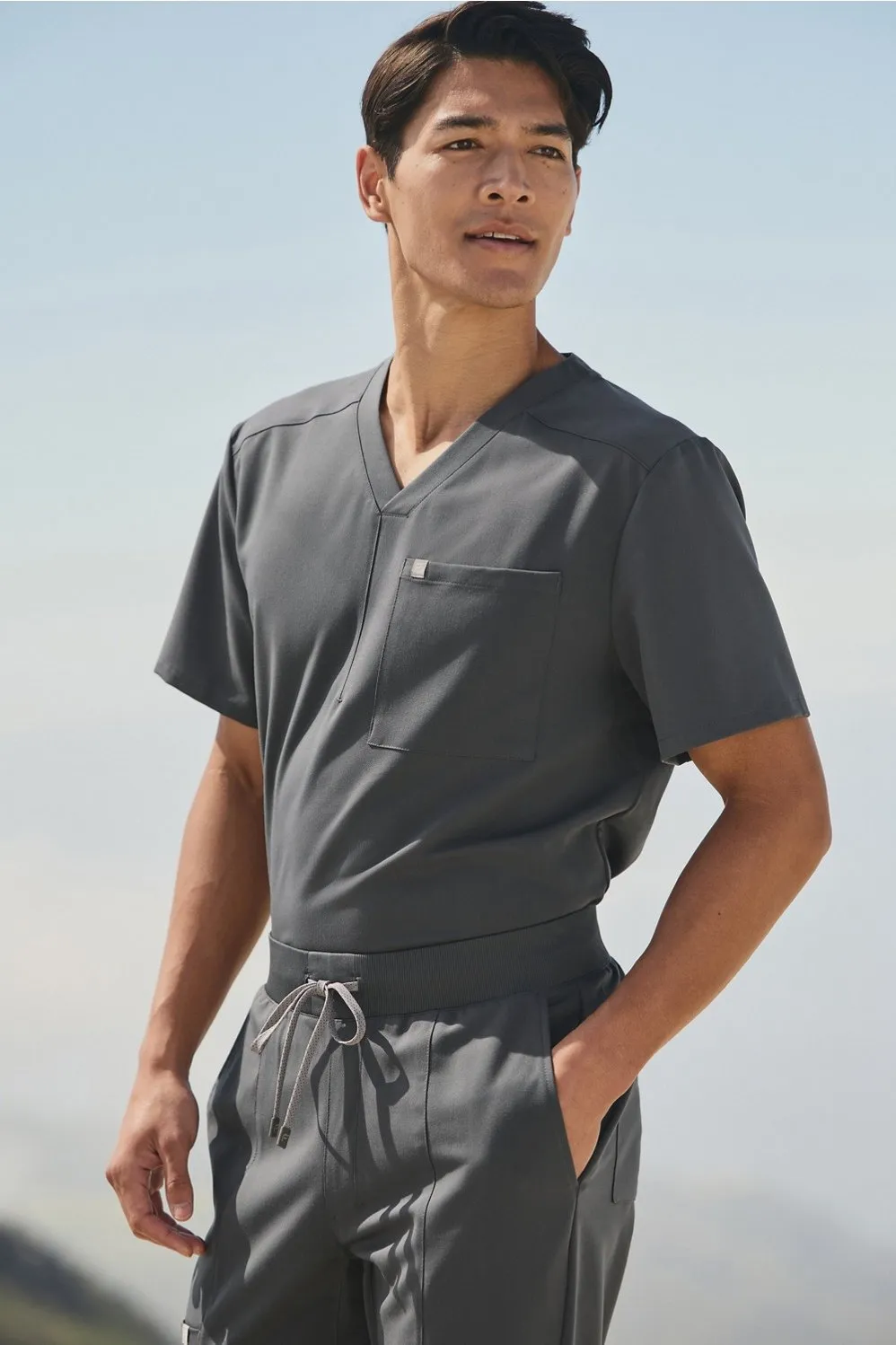 Helix 1-Pocket Scrub Top sold by Fabletics