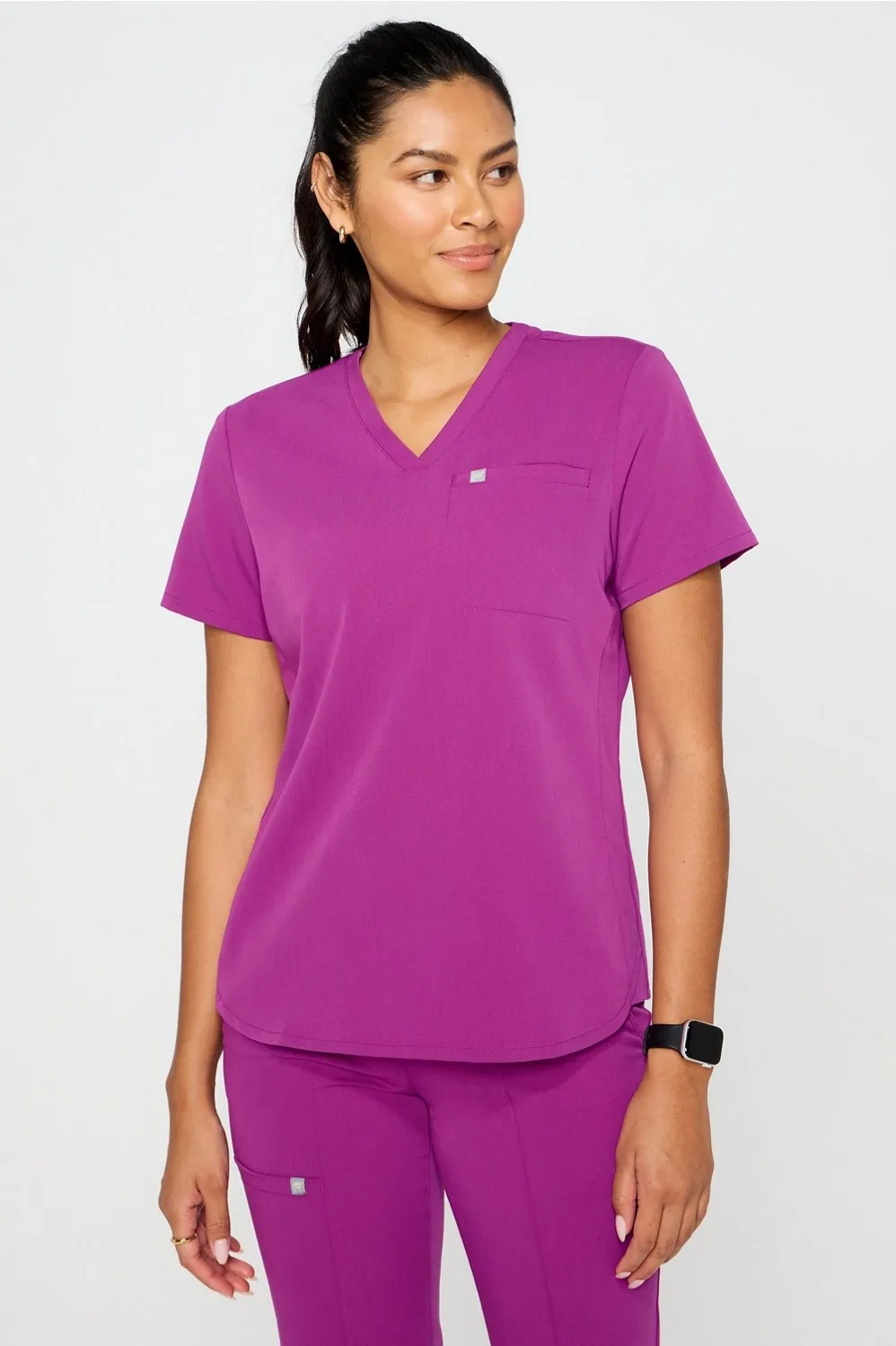 Vital 1-Pocket Scrub Top sold by Fabletics