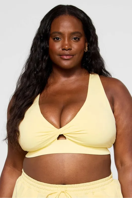 Oasis Twist Medium Impact Sports Bra sold by Fabletics