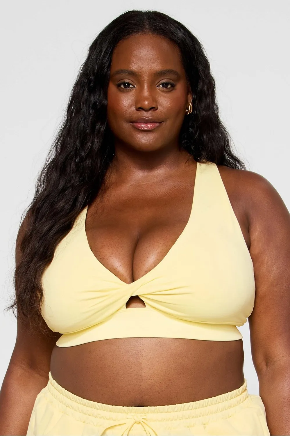 Oasis Twist Medium Impact Sports Bra sold by Fabletics