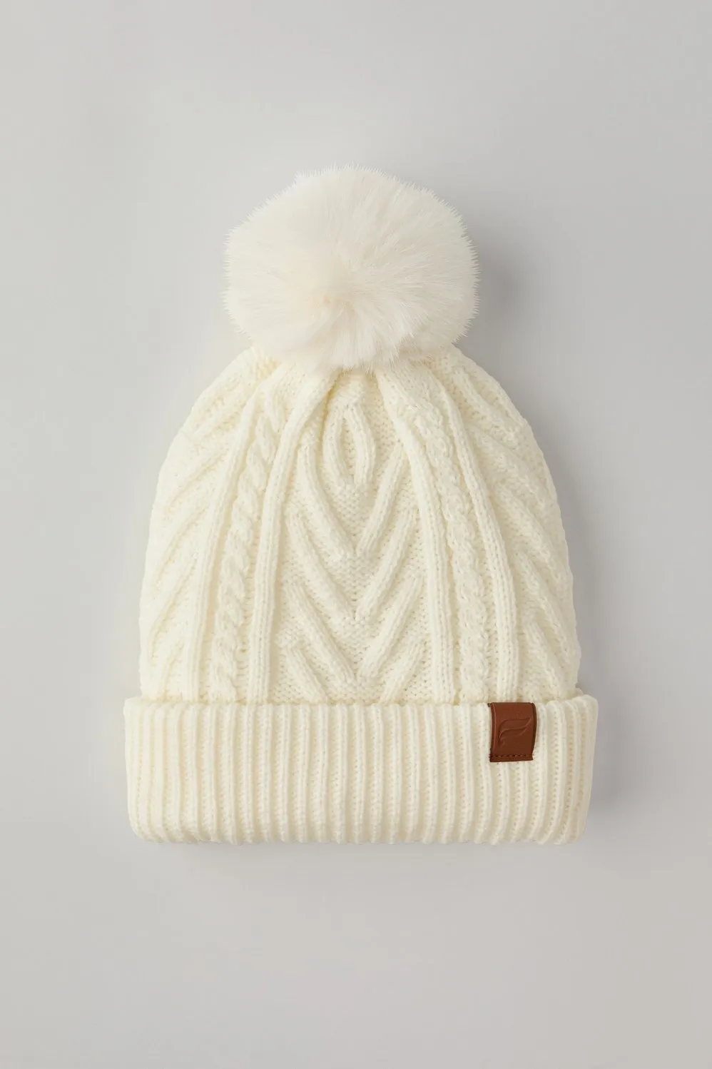 The Pom Pom Beanie sold by Fabletics