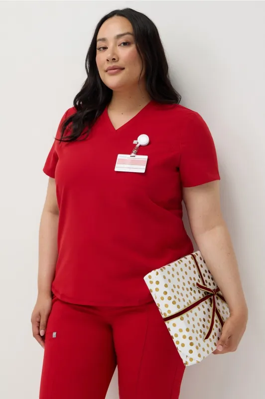 Vital Flex Scrub Top sold by Fabletics