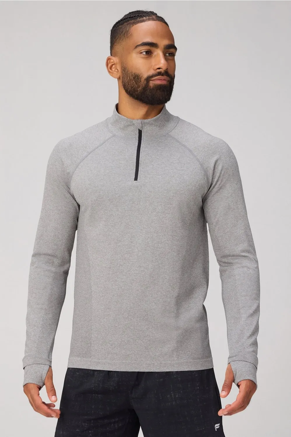 The Training Day Quarter Zip sold by Fabletics