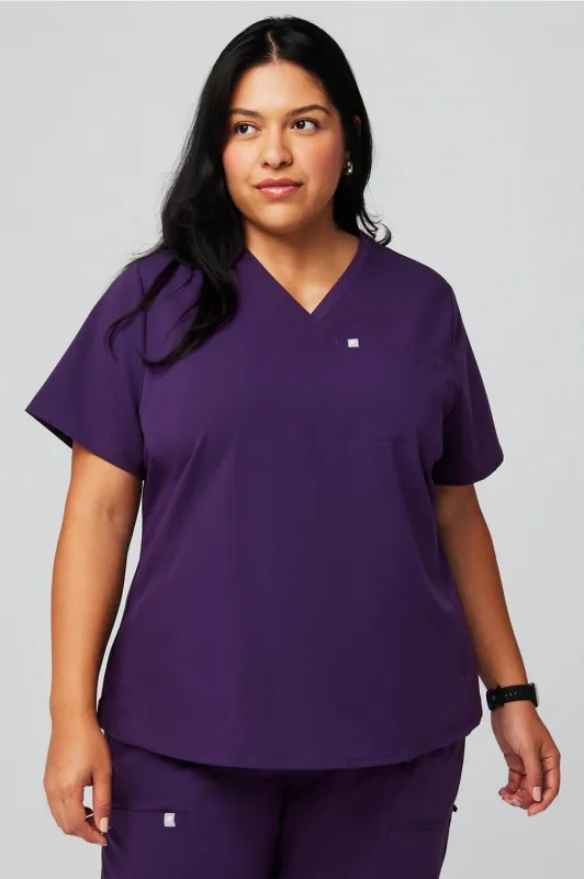 Vital 1-Pocket Scrub Top sold by Fabletics