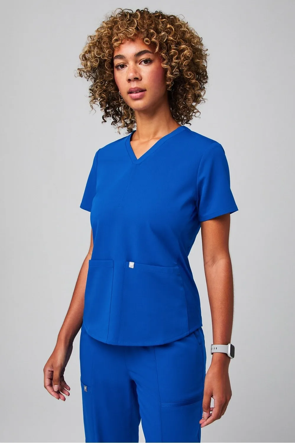 Method Flex 2-Pocket Scrub Top sold by Fabletics