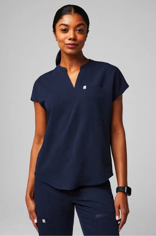 Evolve 3-Pocket Scrub Top sold by Fabletics