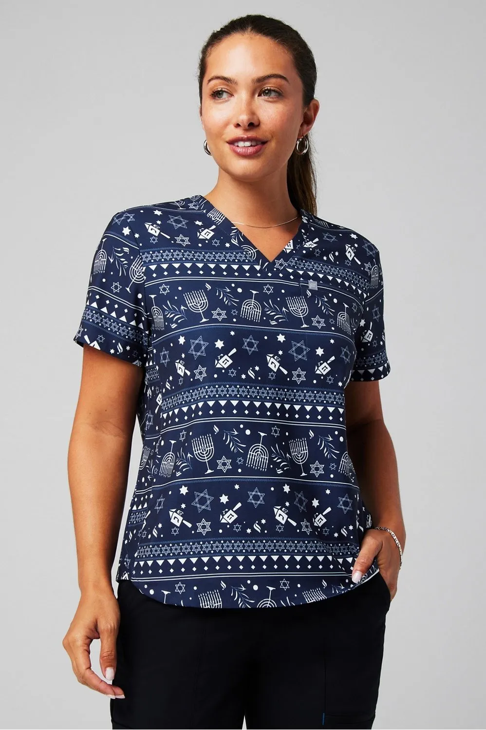 Vital 1-Pocket Scrub Top sold by Fabletics