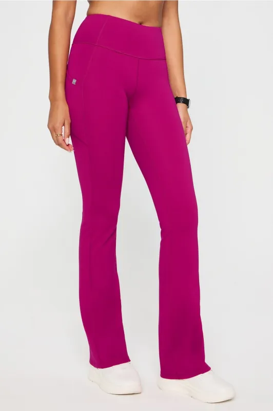 StretchTech™ Kick Flare Scrub Legging sold by Fabletics