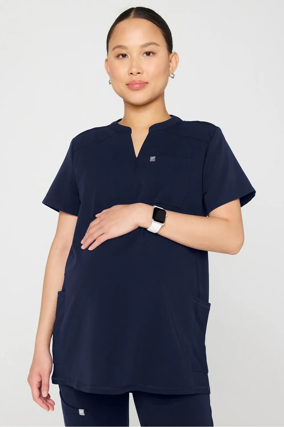 Instinct Maternity 3-Pocket Scrub Top sold by Fabletics