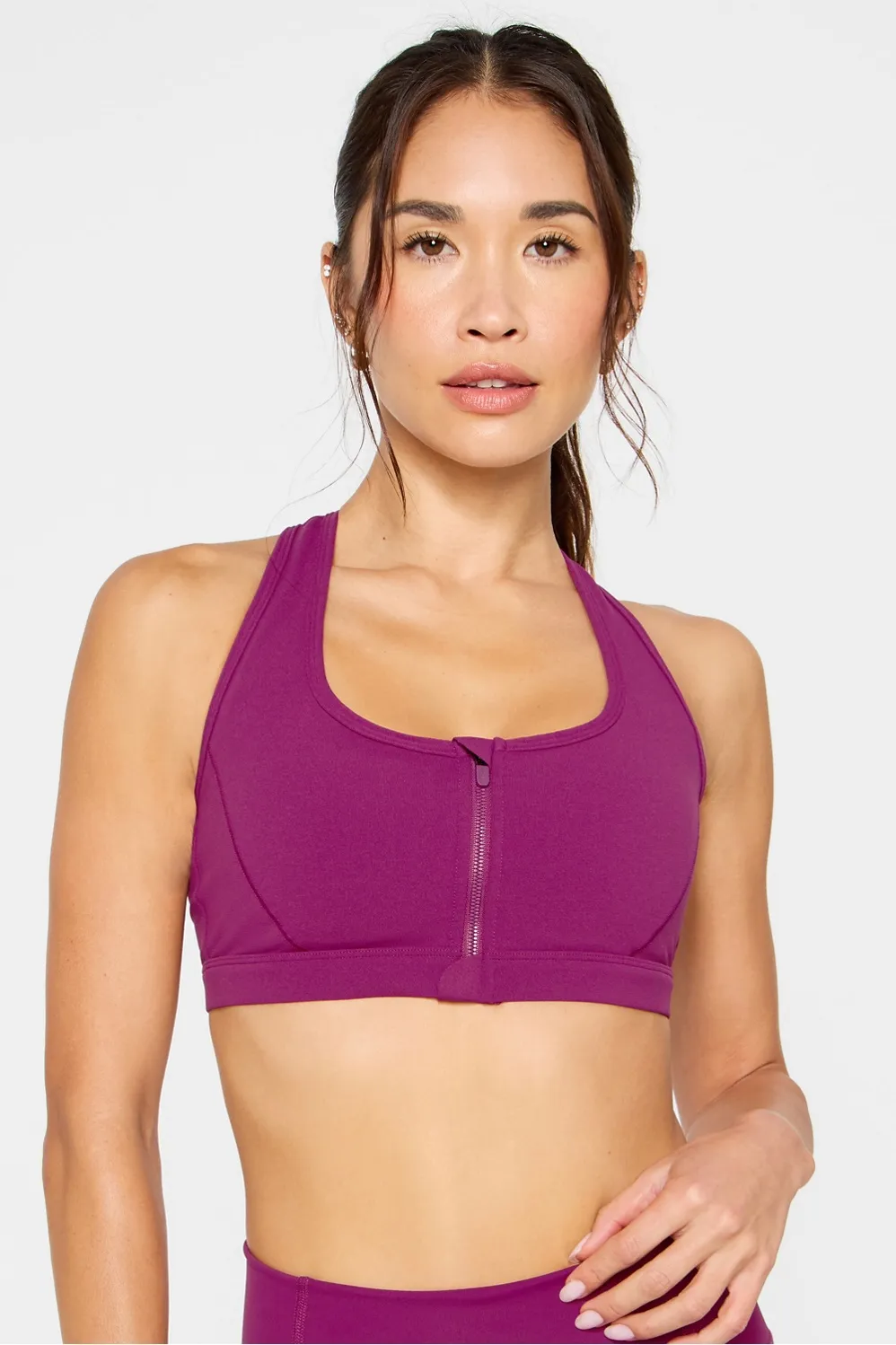 Essential Front Zip Medium Impact Sports Bra sold by Fabletics