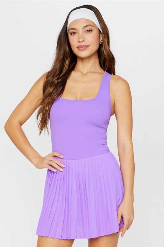 Hot Shot Pleated Dress Classic Mini sold by Fabletics