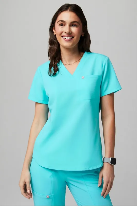 Vital 1-Pocket Scrub Top sold by Fabletics