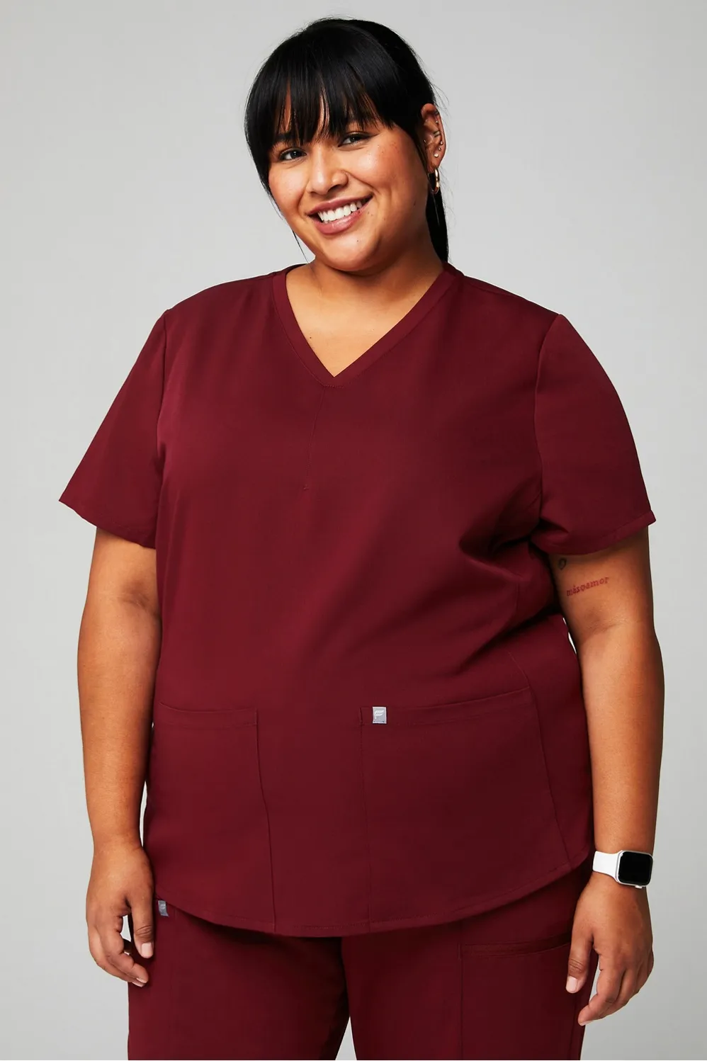 Method 2-Pocket Scrub Top sold by Fabletics