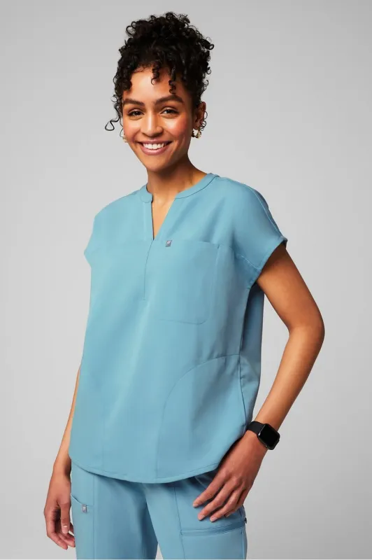 Evolve 3-Pocket Scrub Top sold by Fabletics