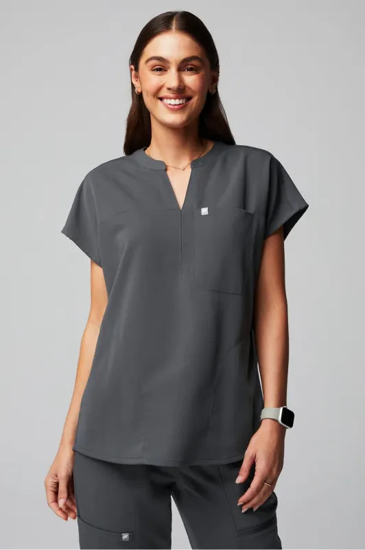 Evolve 3-Pocket Scrub Top sold by Fabletics
