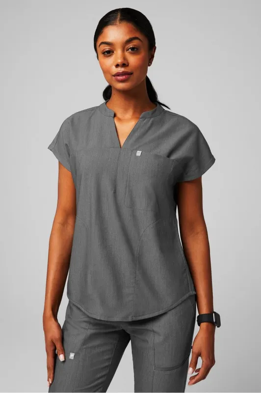 Evolve Scrub Top sold by Fabletics