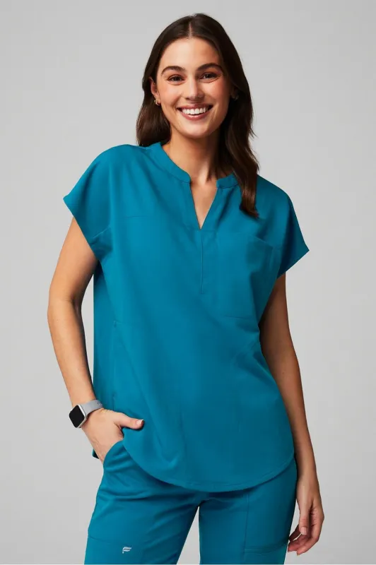 Evolve 3-Pocket Scrub Top sold by Fabletics