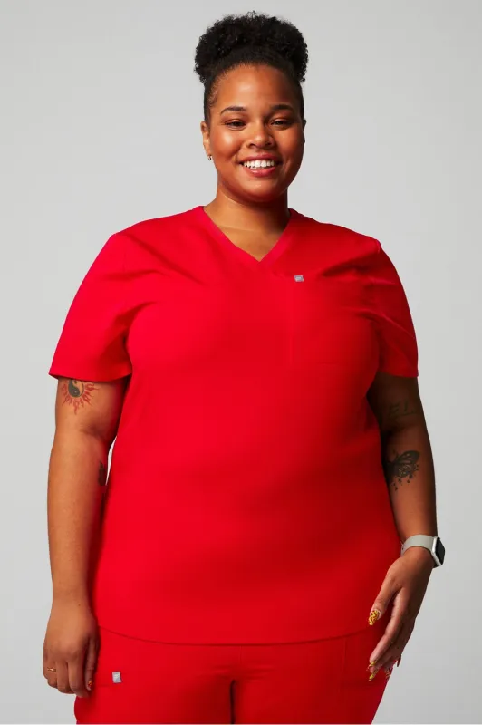 Vital 1-Pocket Scrub Top sold by Fabletics