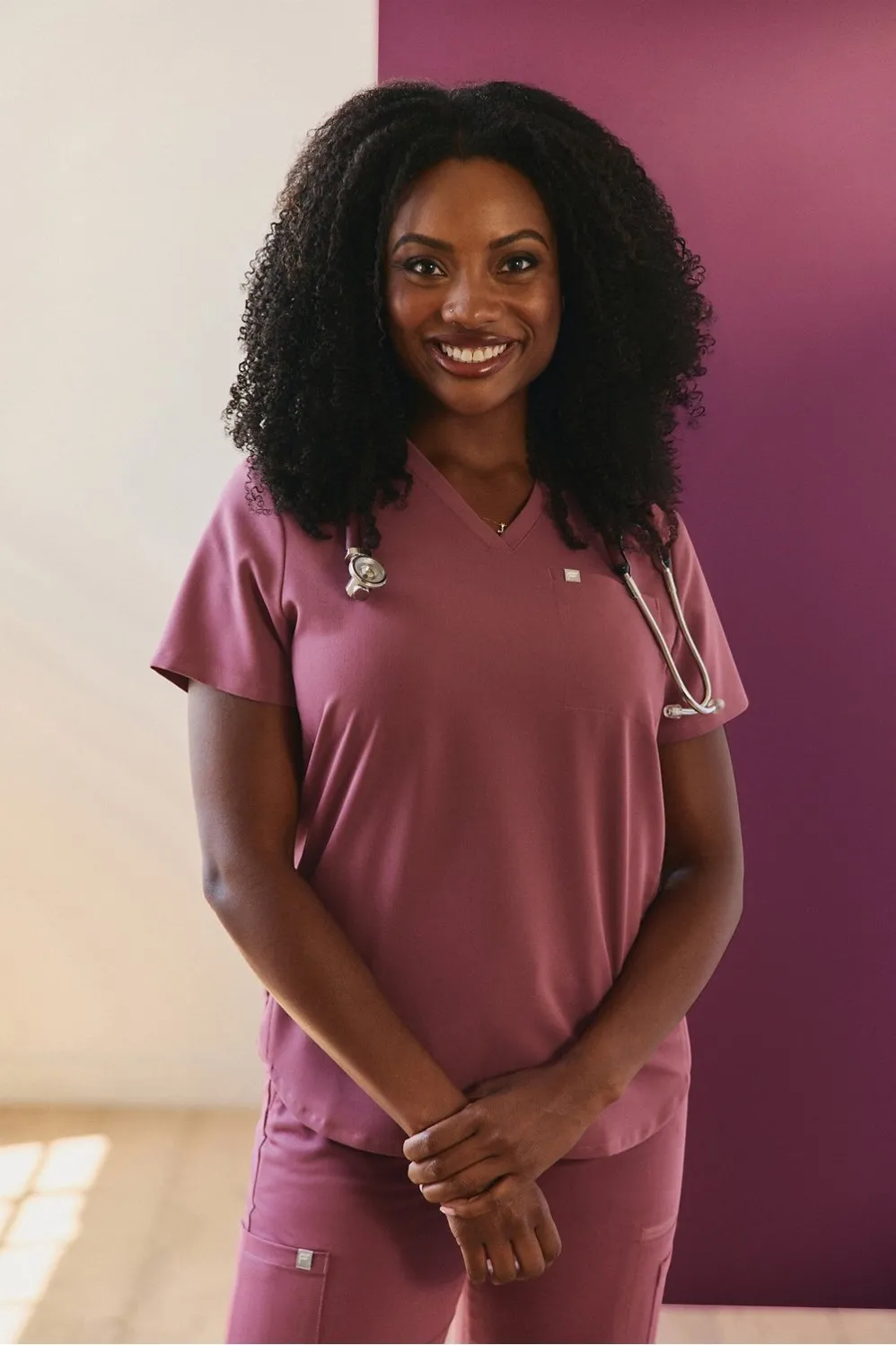 Vital 1-Pocket Scrub Top sold by Fabletics