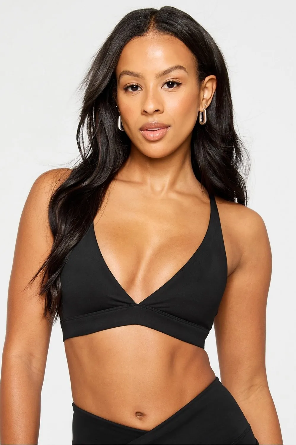 Low Impact PureLuxe Triangle Bra sold by Fabletics