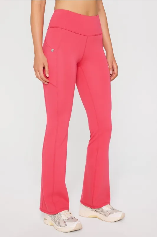 StretchTech™ Kick Flare Scrub Legging sold by Fabletics