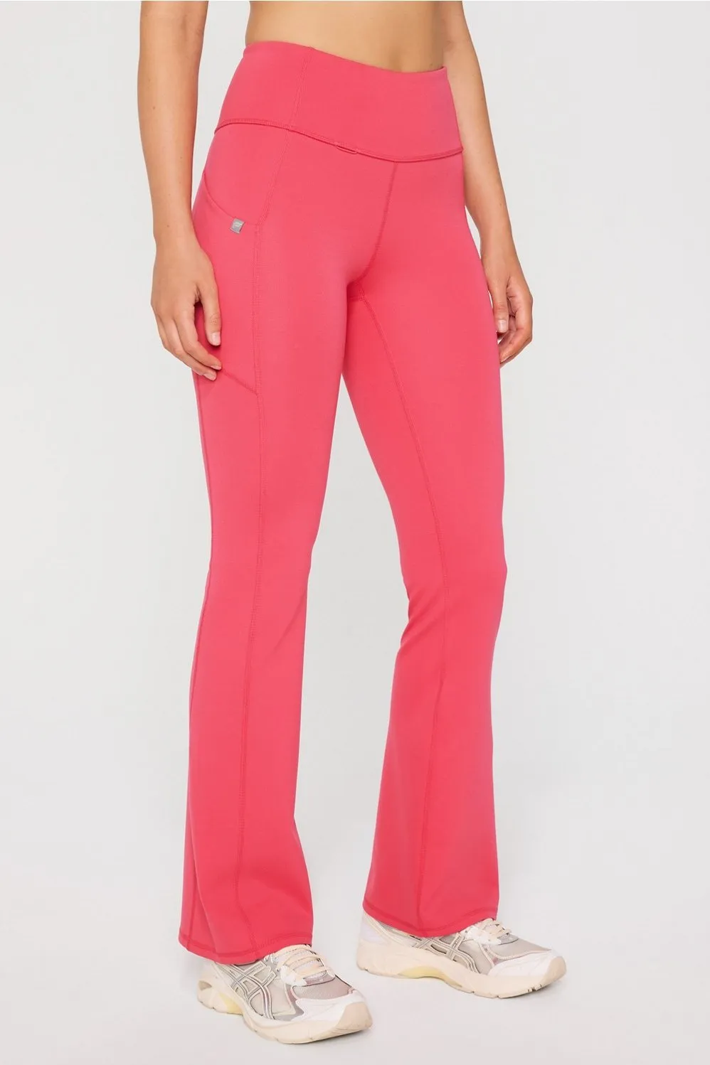 StretchTech™ Kick Flare Scrub Legging sold by Fabletics