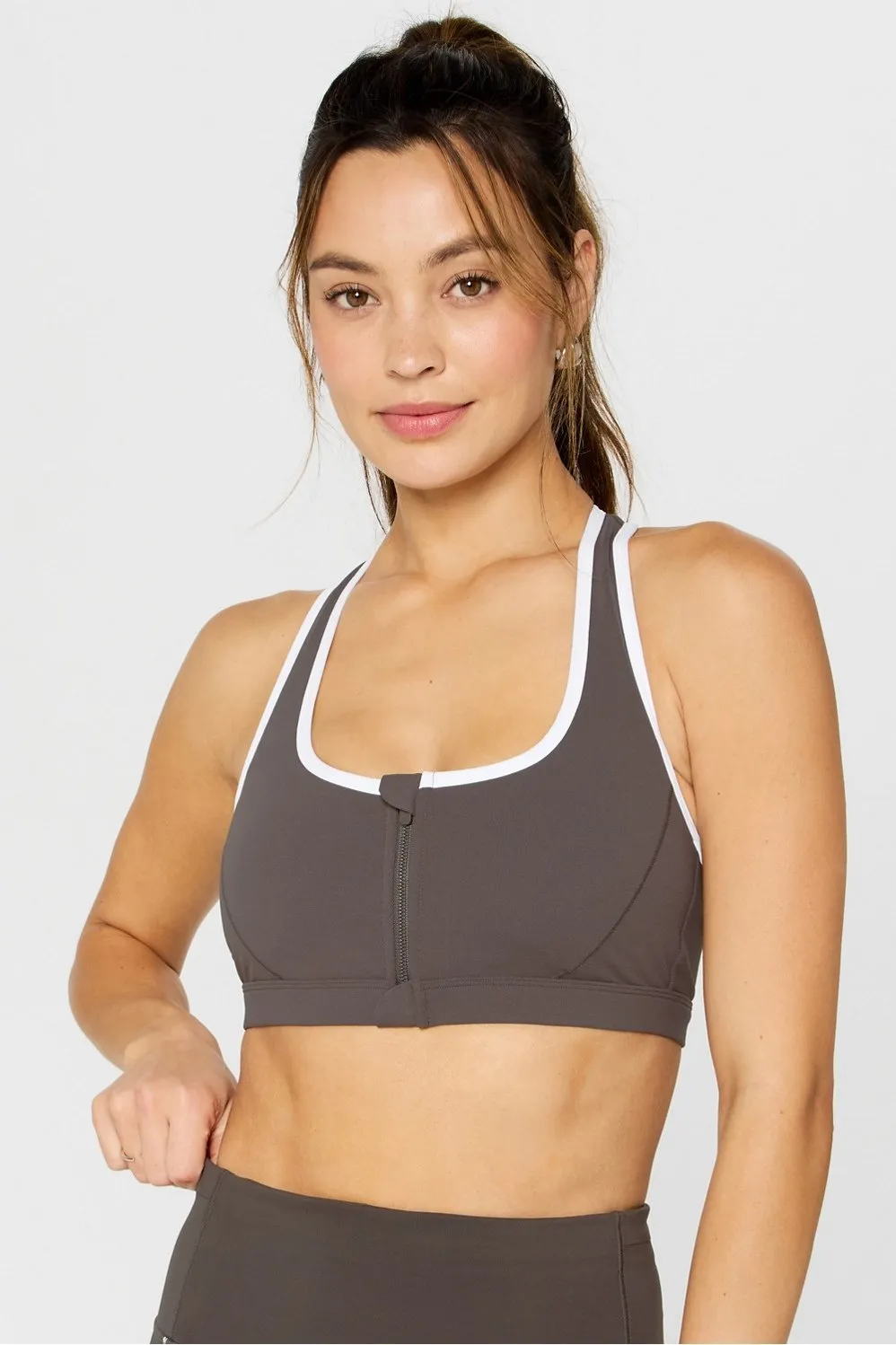 Essential Front Zip Medium Impact Sports Bra sold by Fabletics