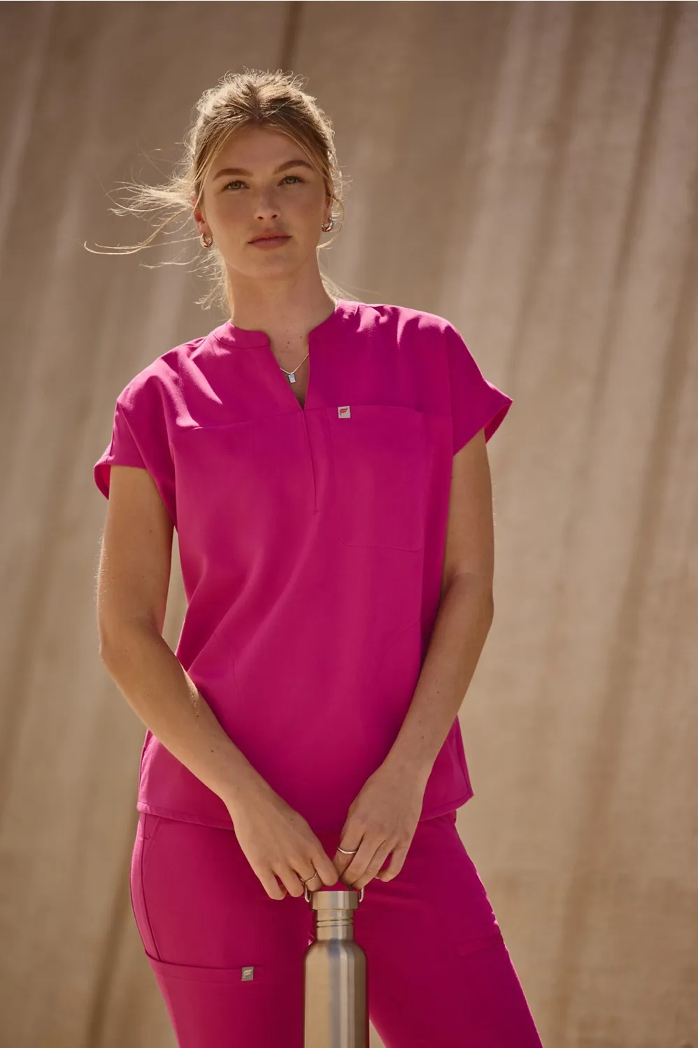 Evolve Oversized Scrub Top sold by Fabletics