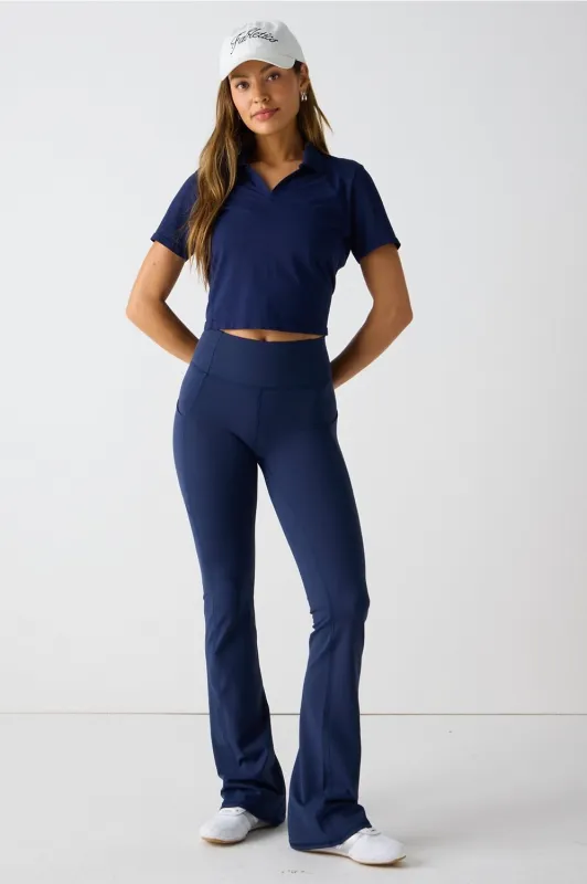 Feather Tech+ Short-Sleeve Polo + Oasis High-Waisted Kick Flare 2-Piece Outfit sold by Fabletics