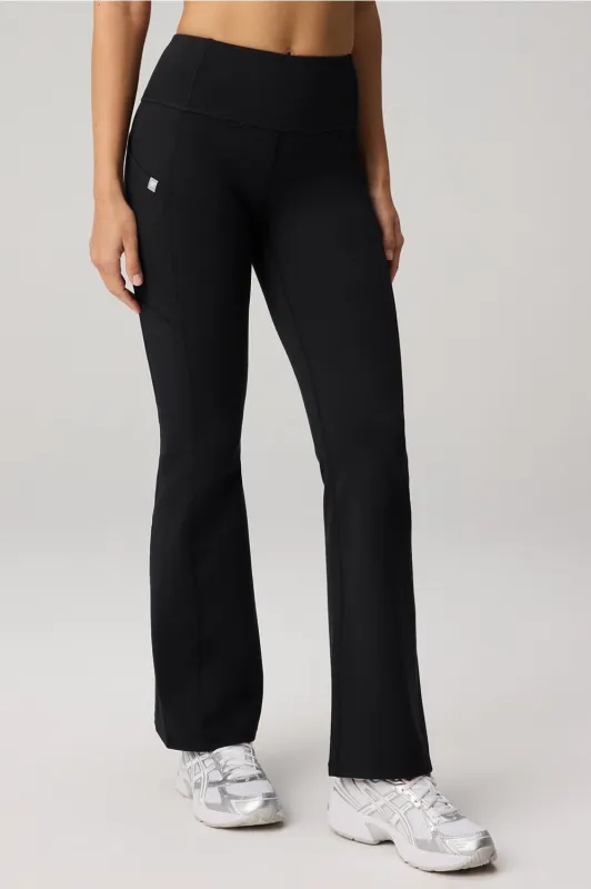 StretchTech™ Kick Flare Scrub Legging sold by Fabletics
