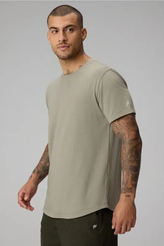 The 24-7 Tee (Curved Hem) sold by Fabletics
