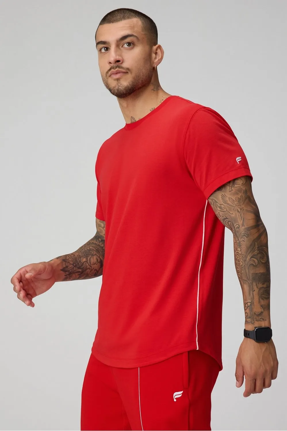 The 24-7 Tee (Curved Hem) sold by Fabletics