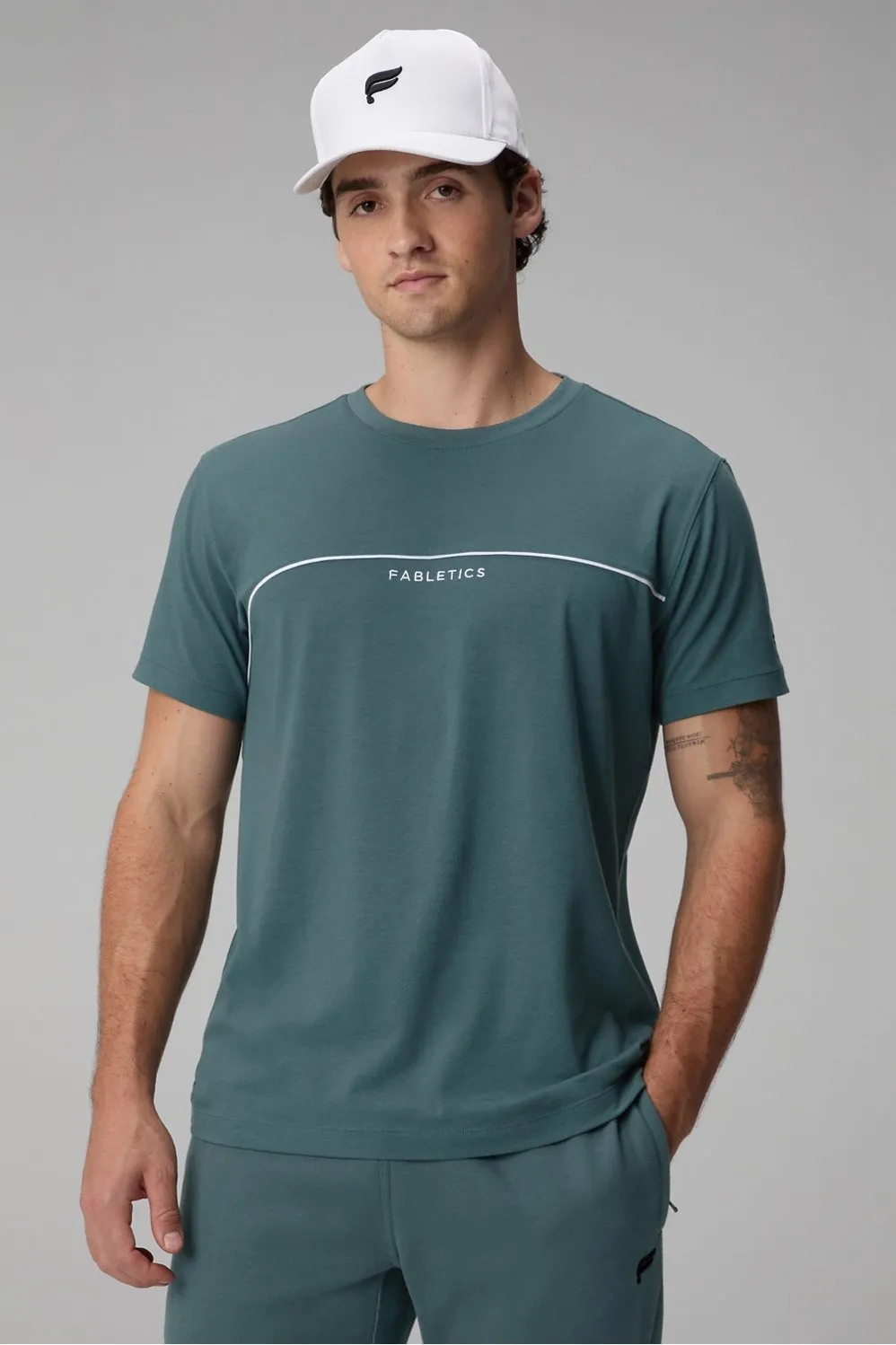 The 24-7 Tee sold by Fabletics