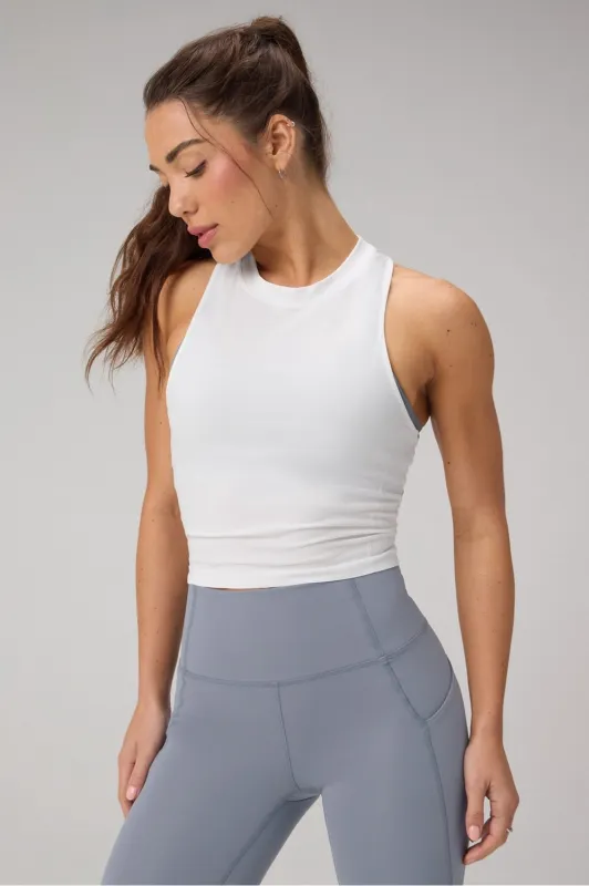 Feather Tech+ Racerback Cropped Tank sold by Fabletics