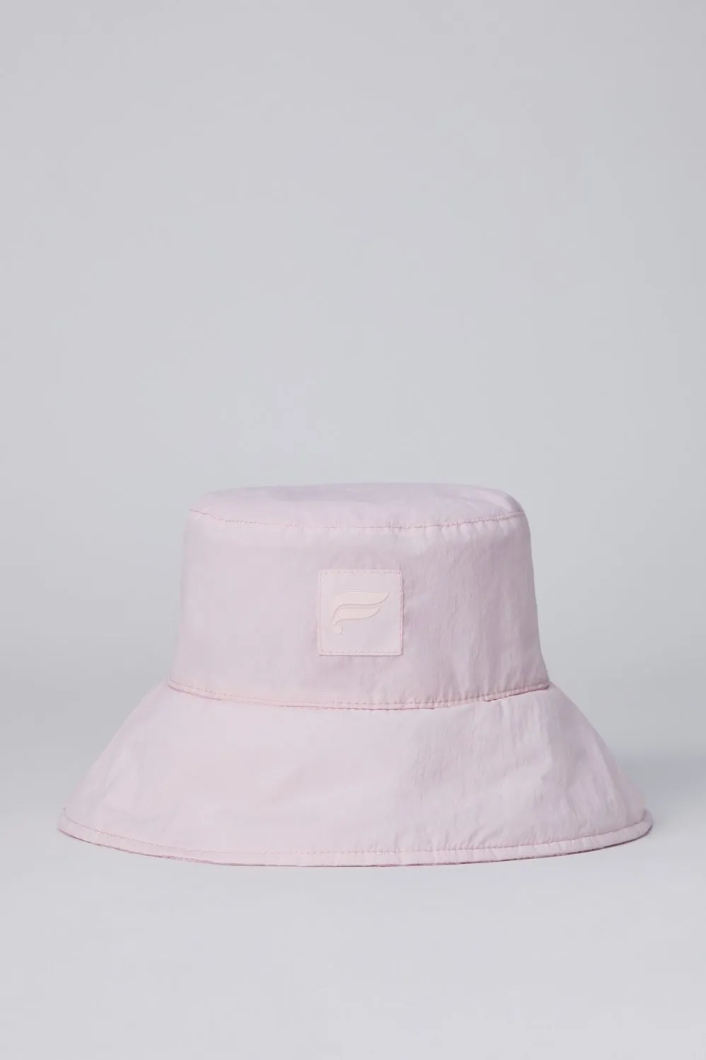 The Maxi Cabas Reversible Bucket Hat sold by Fabletics