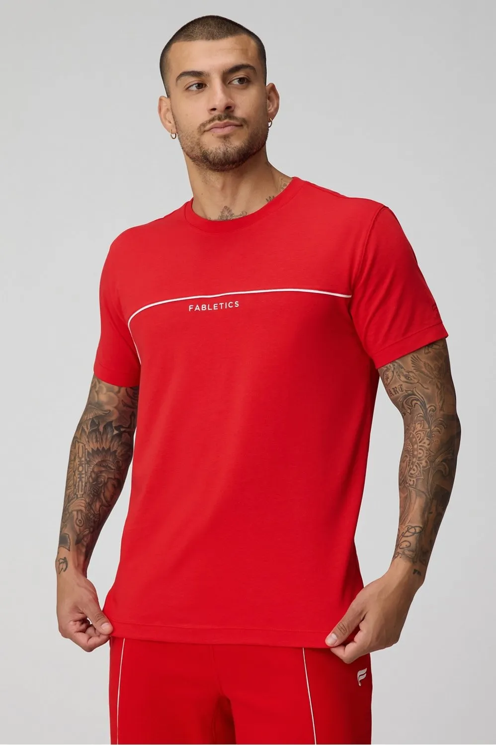 The 24-7 Tee sold by Fabletics