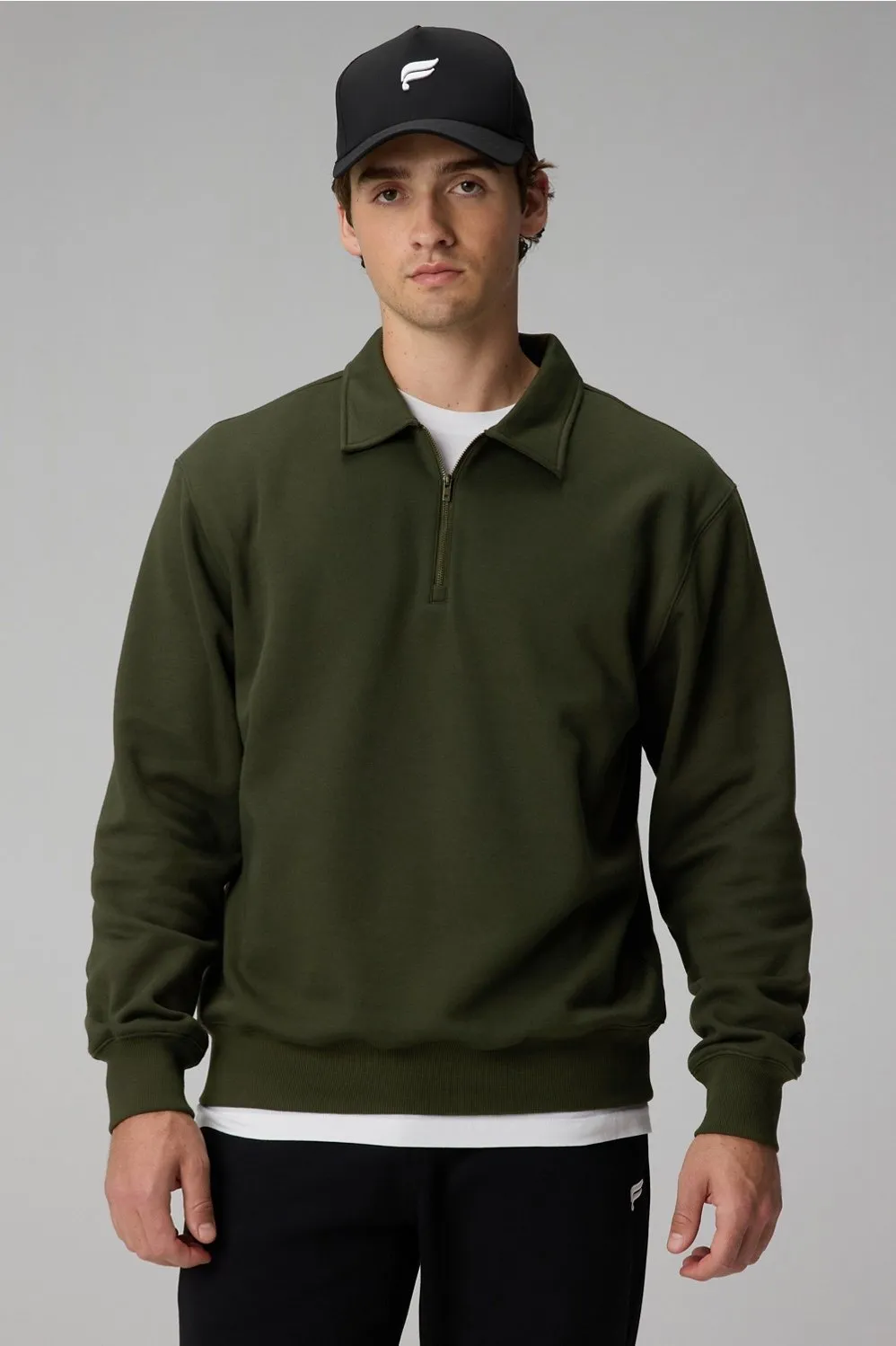 The Go-To Quarter Zip Polo sold by Fabletics