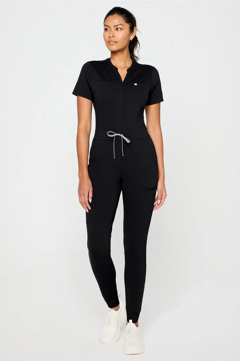 PonteFlex Empower Scrub Jumpsuit sold by Fabletics