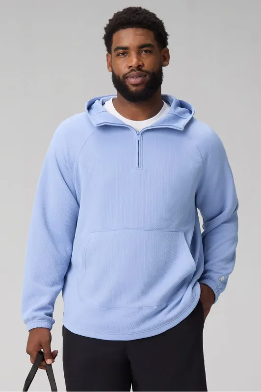The GridTech Quarter Zip Hoodie sold by Fabletics