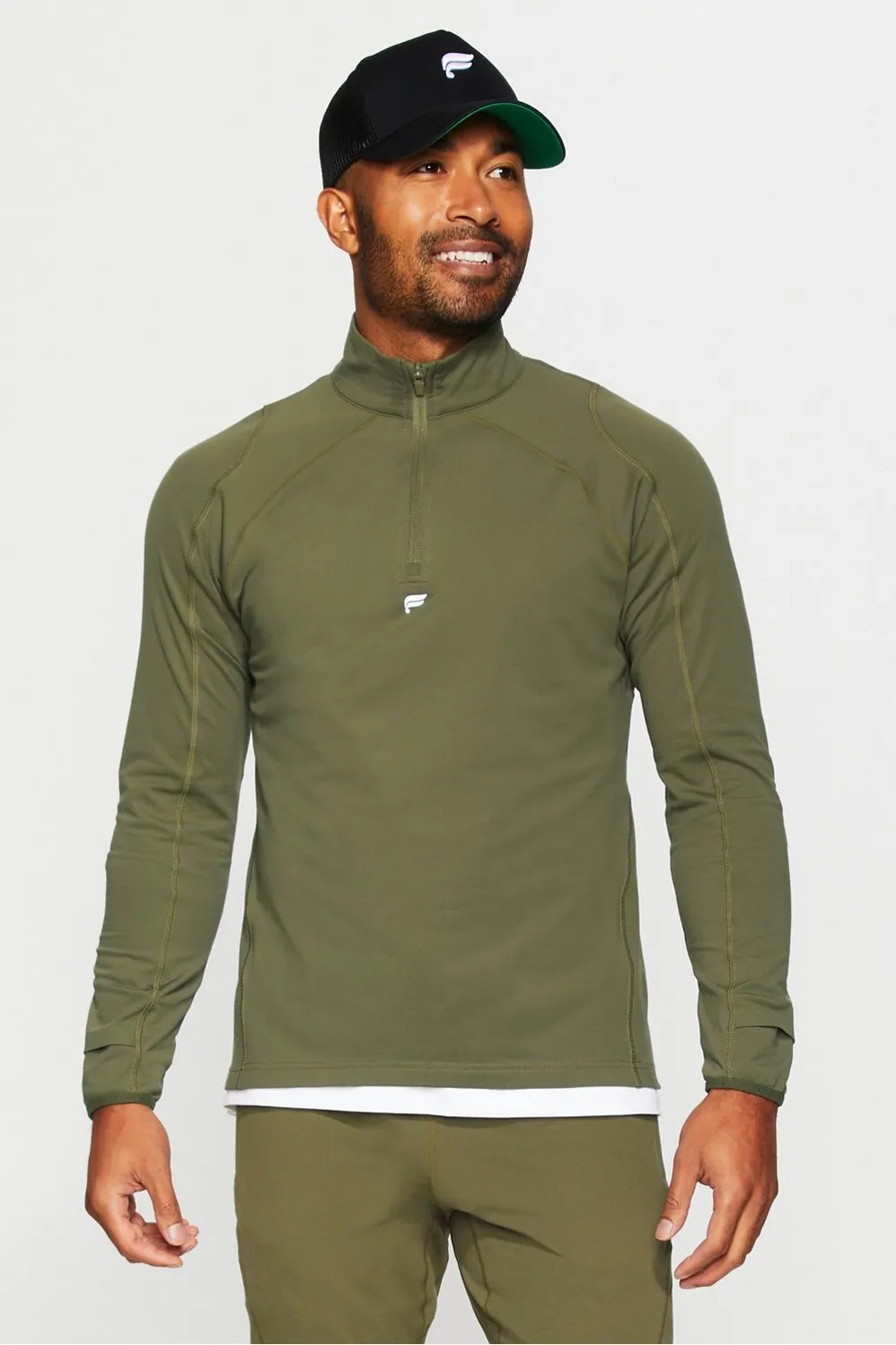 The Altitude Quarter Zip sold by Fabletics