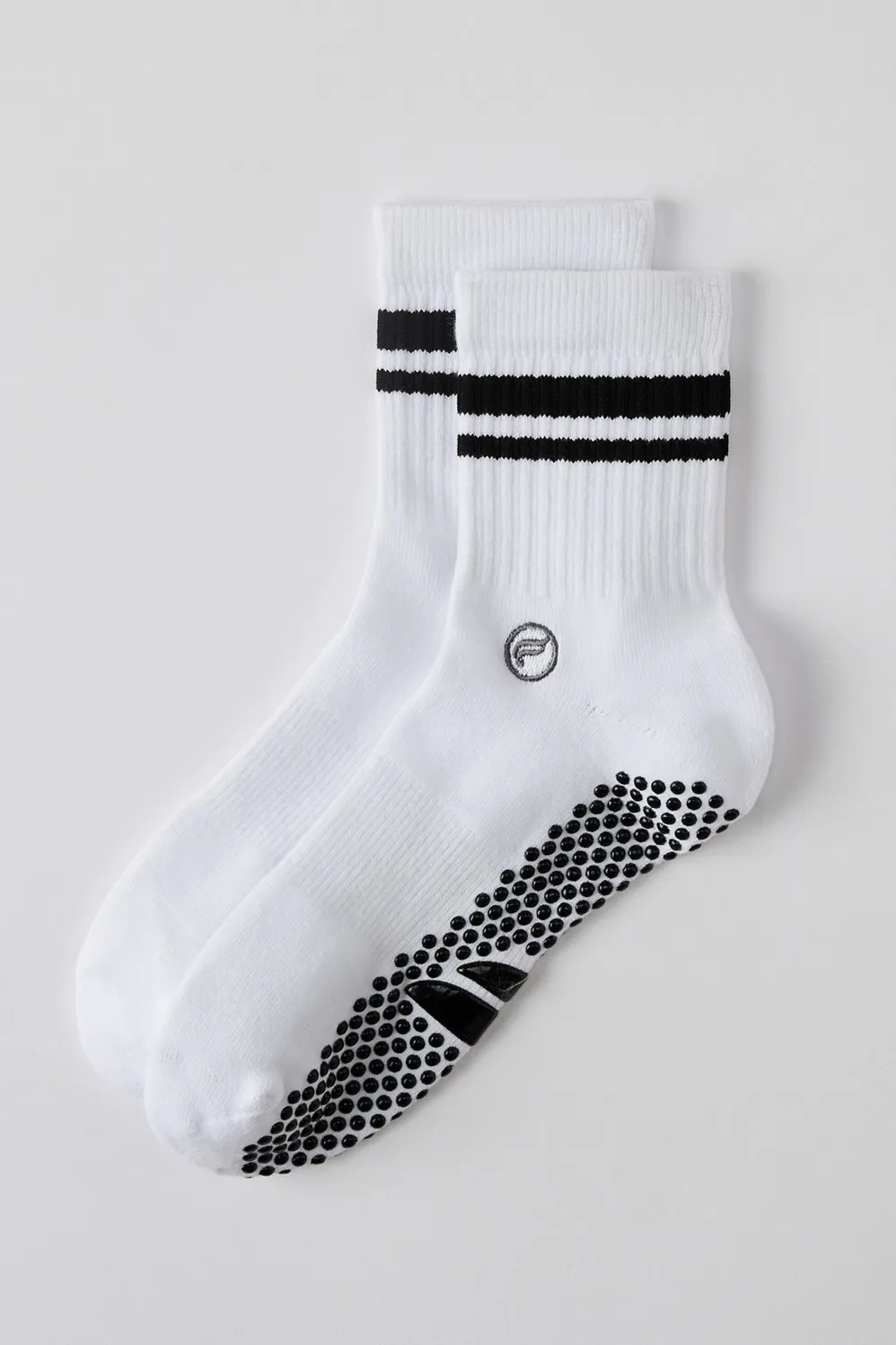 The Powerhouse Quarter Crew Grip Sock sold by Fabletics