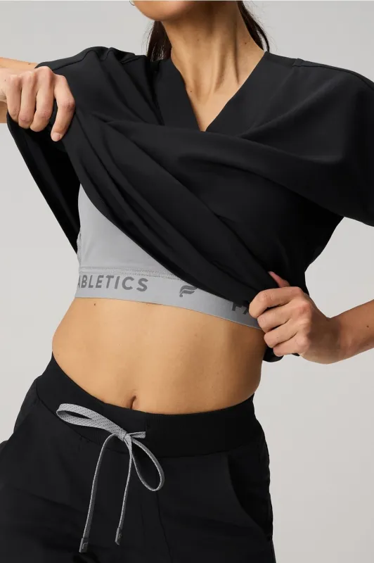 360° Built-In Bra Scrub Top sold by Fabletics
