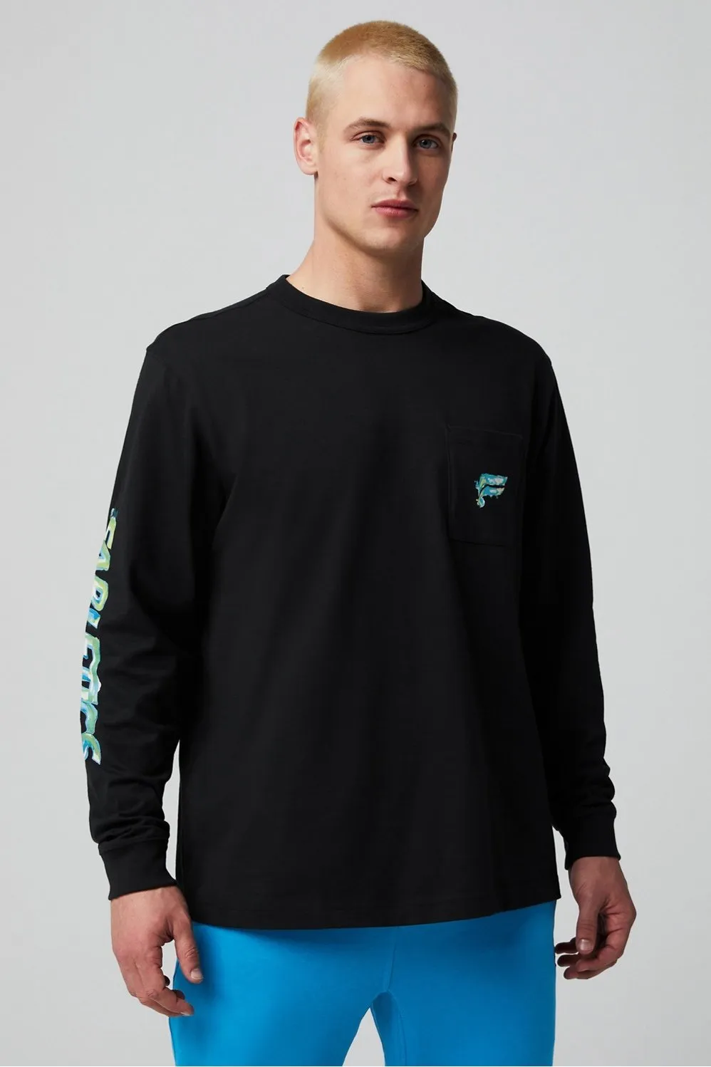 The R&R Long Sleeve Pocket Tee sold by Fabletics