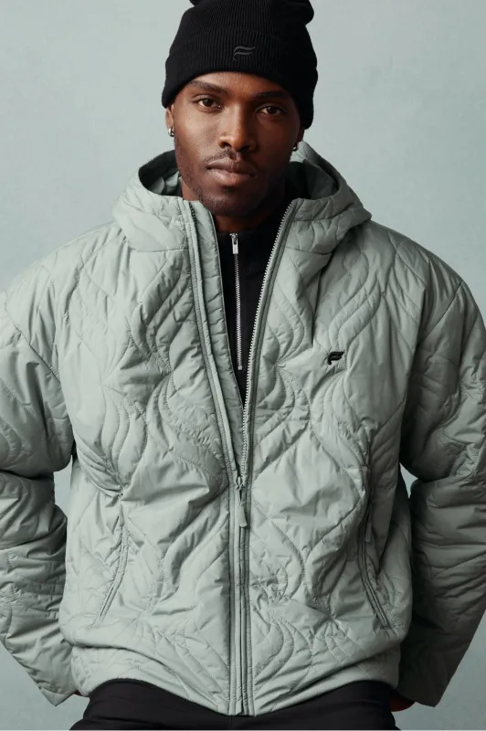 The Chateau Quilted Essential Puffer sold by Fabletics