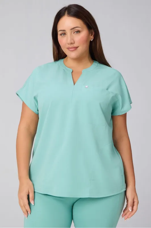 Evolve Oversized Scrub Top sold by Fabletics