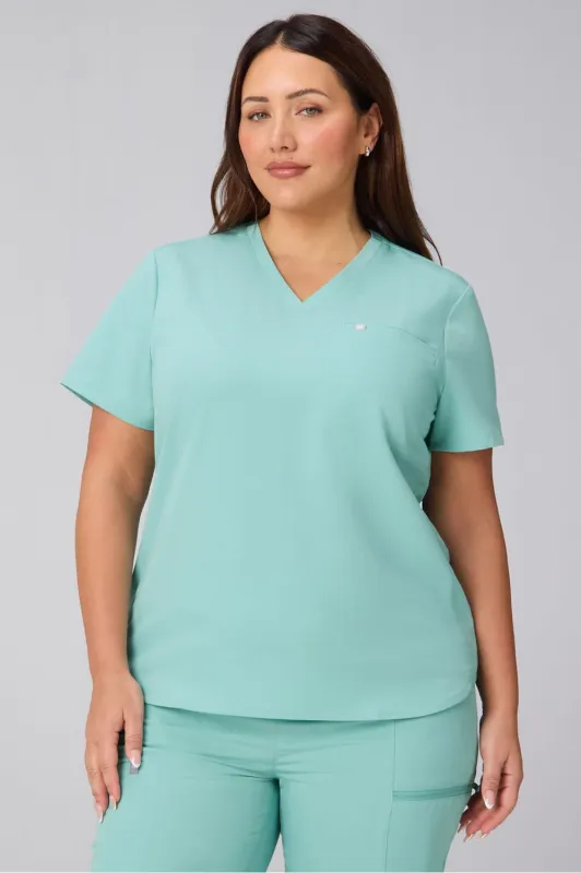 Vital 1-Pocket Scrub Top sold by Fabletics