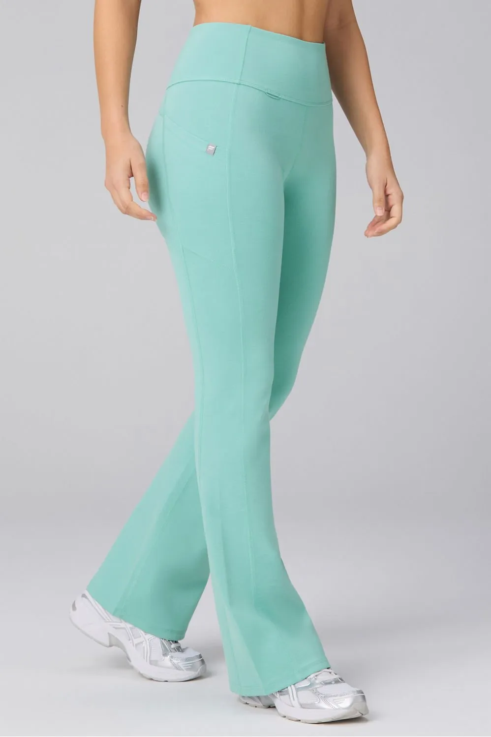 StretchTech™ Kick Flare Scrub Legging sold by Fabletics