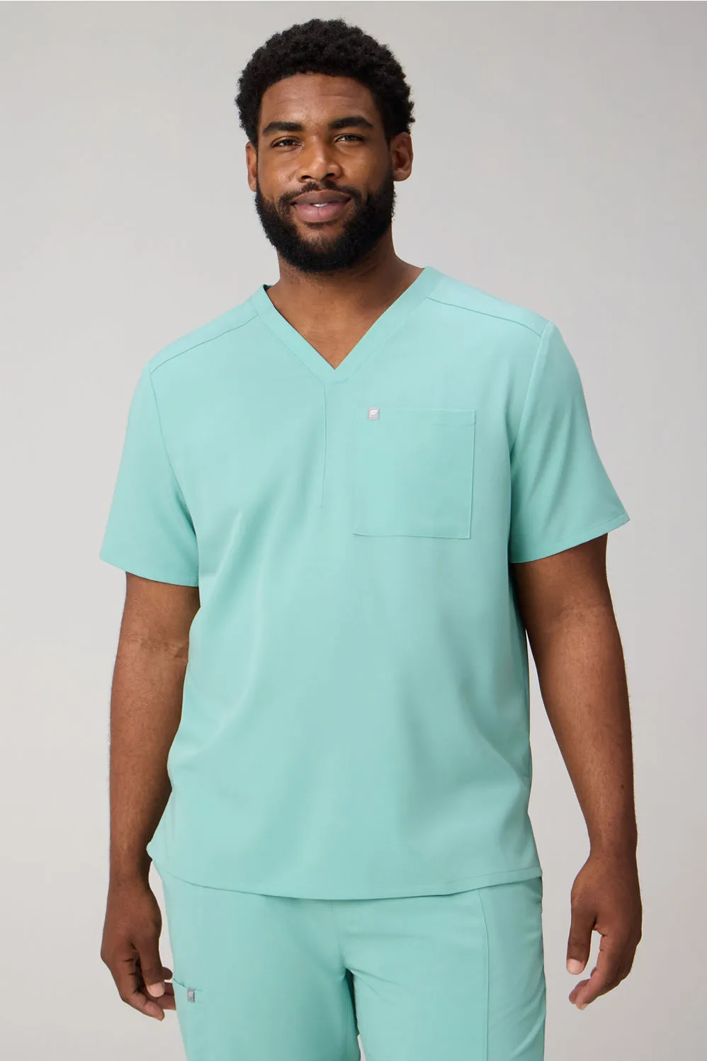 Helix Scrub Top sold by Fabletics